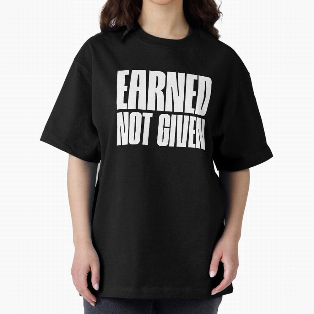 Earned not given white Oversized T-Shirt Step into Global Football Passion for FIFA World Cup 2026 USA Canada Mexico, Highlighting Cristiano Ronaldo, Haaland and CR7, Argentina, France and Brazil, Football History, Final Match Energy, Crowd Noise