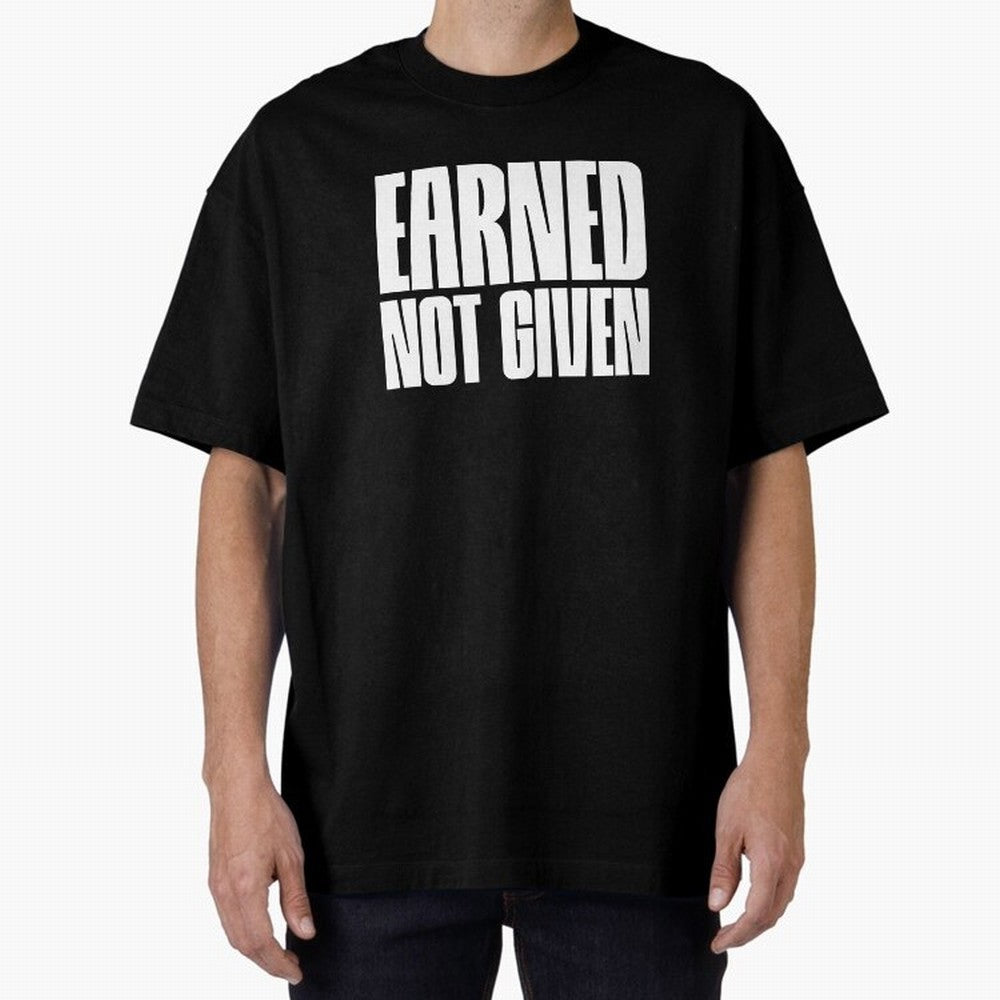 Earned not given white Oversized T-Shirt Step into Global Football Passion for FIFA World Cup 2026 USA Canada Mexico, Highlighting Cristiano Ronaldo, Haaland and CR7, Argentina, France and Brazil, Football History, Final Match Energy, Crowd Noise